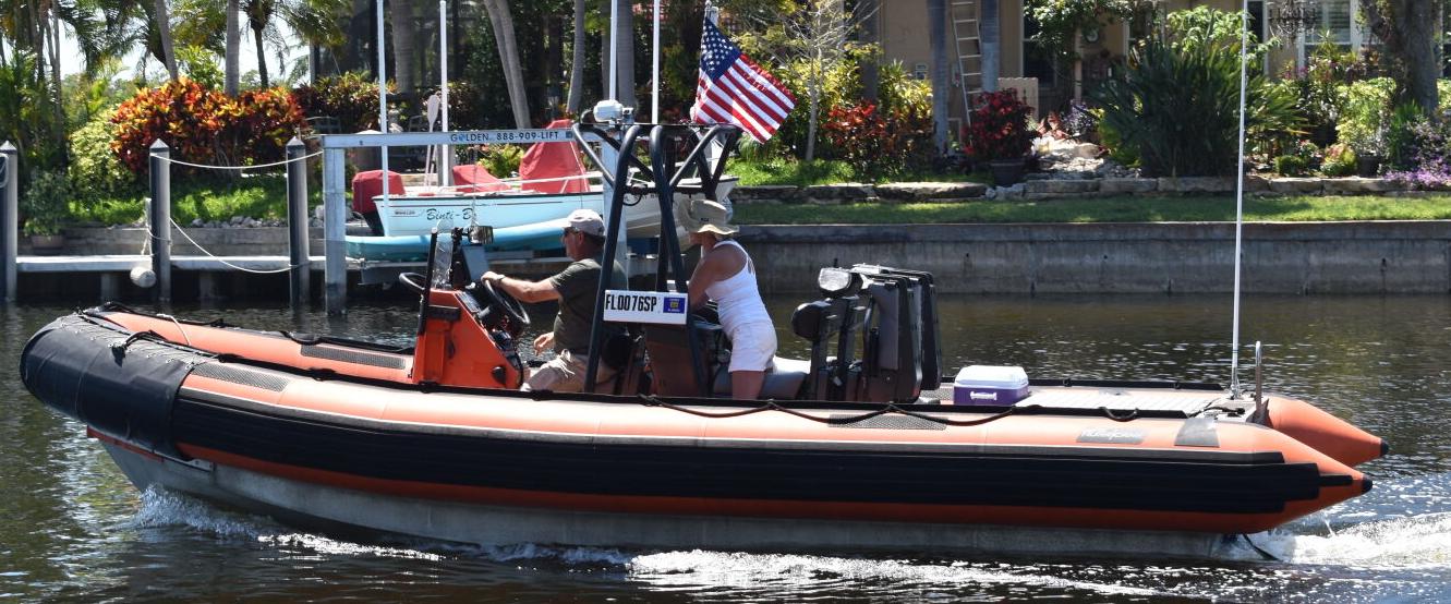 Andy Mele and Cheryl Berlon on the 25' Peace+Myakka Waterkeeper Zodiac
